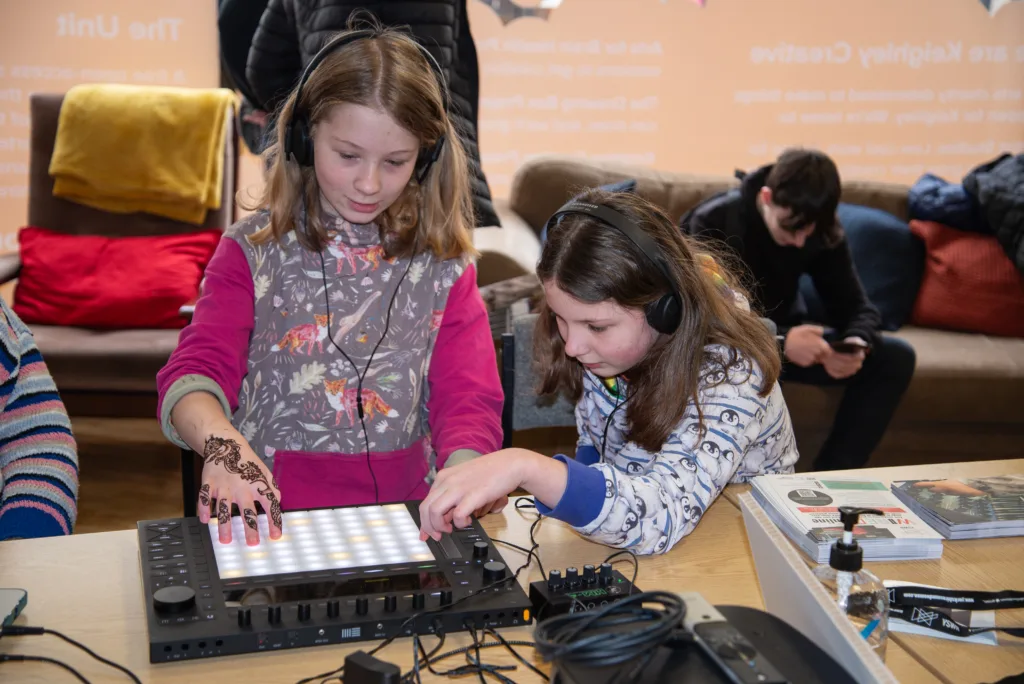 Girls using sound technology at Keighley Creative