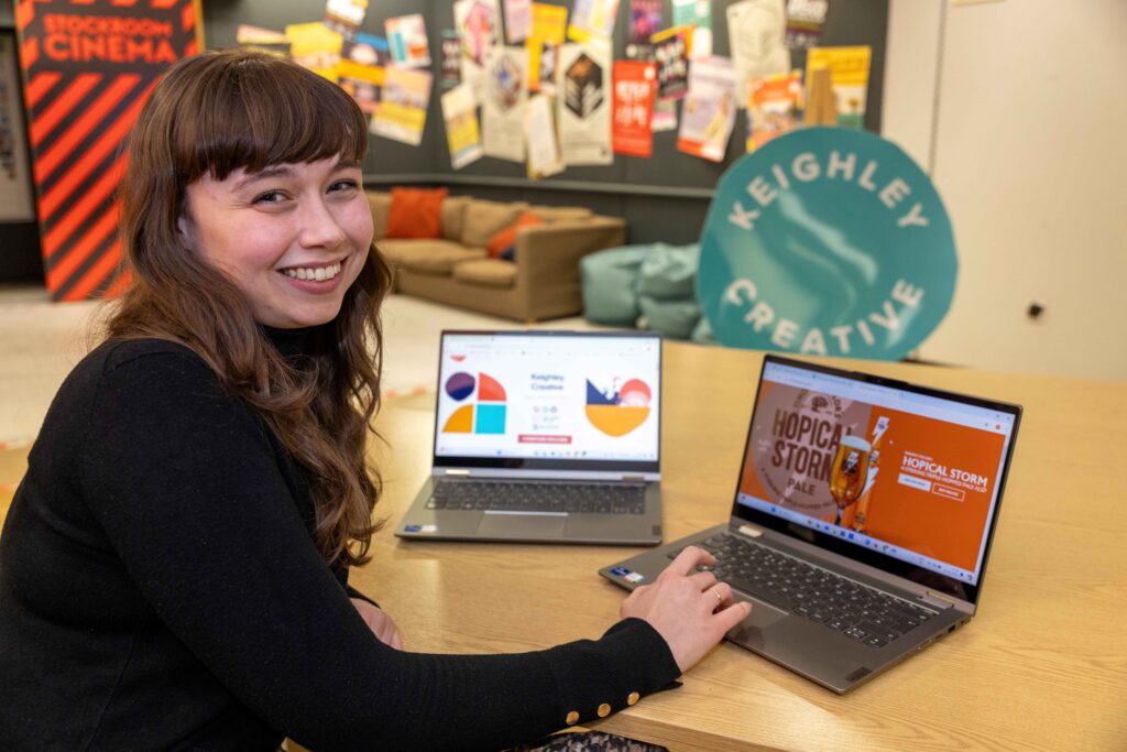 Cat Murray with laptops bought with donation from Timothy Taylor's