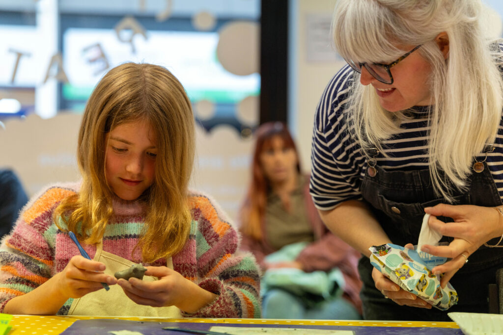 Facilitator and participant at a Keighley Creative workshop